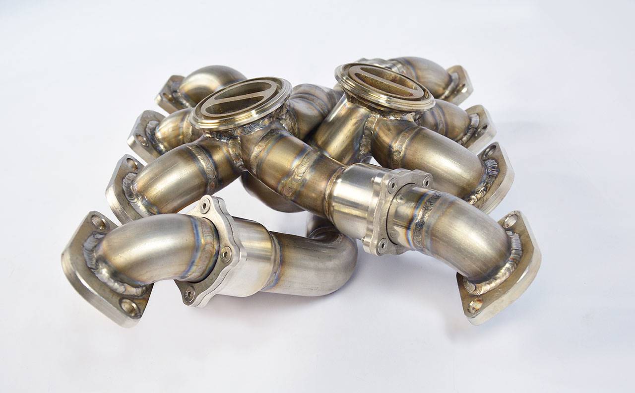 Collettore destro + sinistro AISI 310S<br>per turbine di serie<br>Disponibile su richiesta