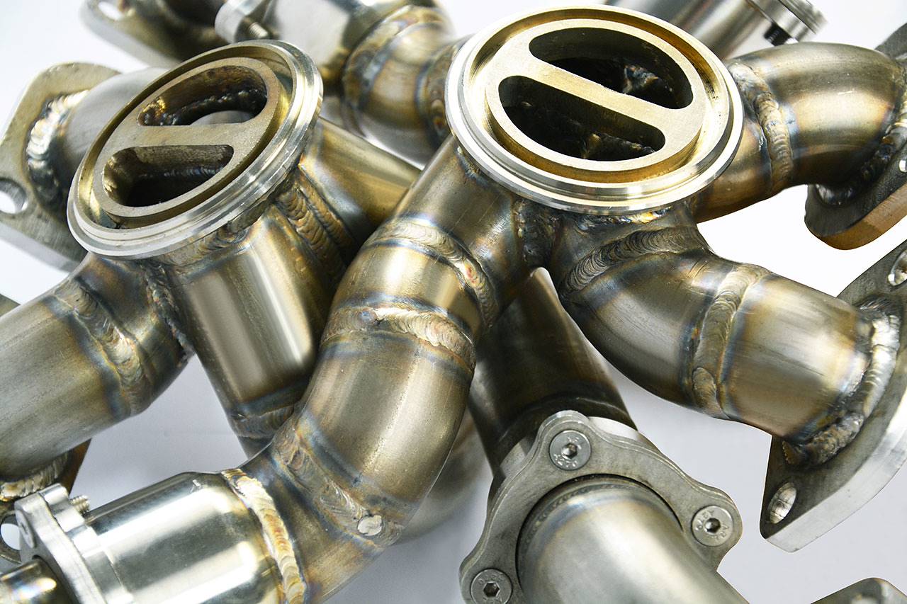 Collettore destro + sinistro AISI 310S<br>per turbine di serie<br>Disponibile su richiesta