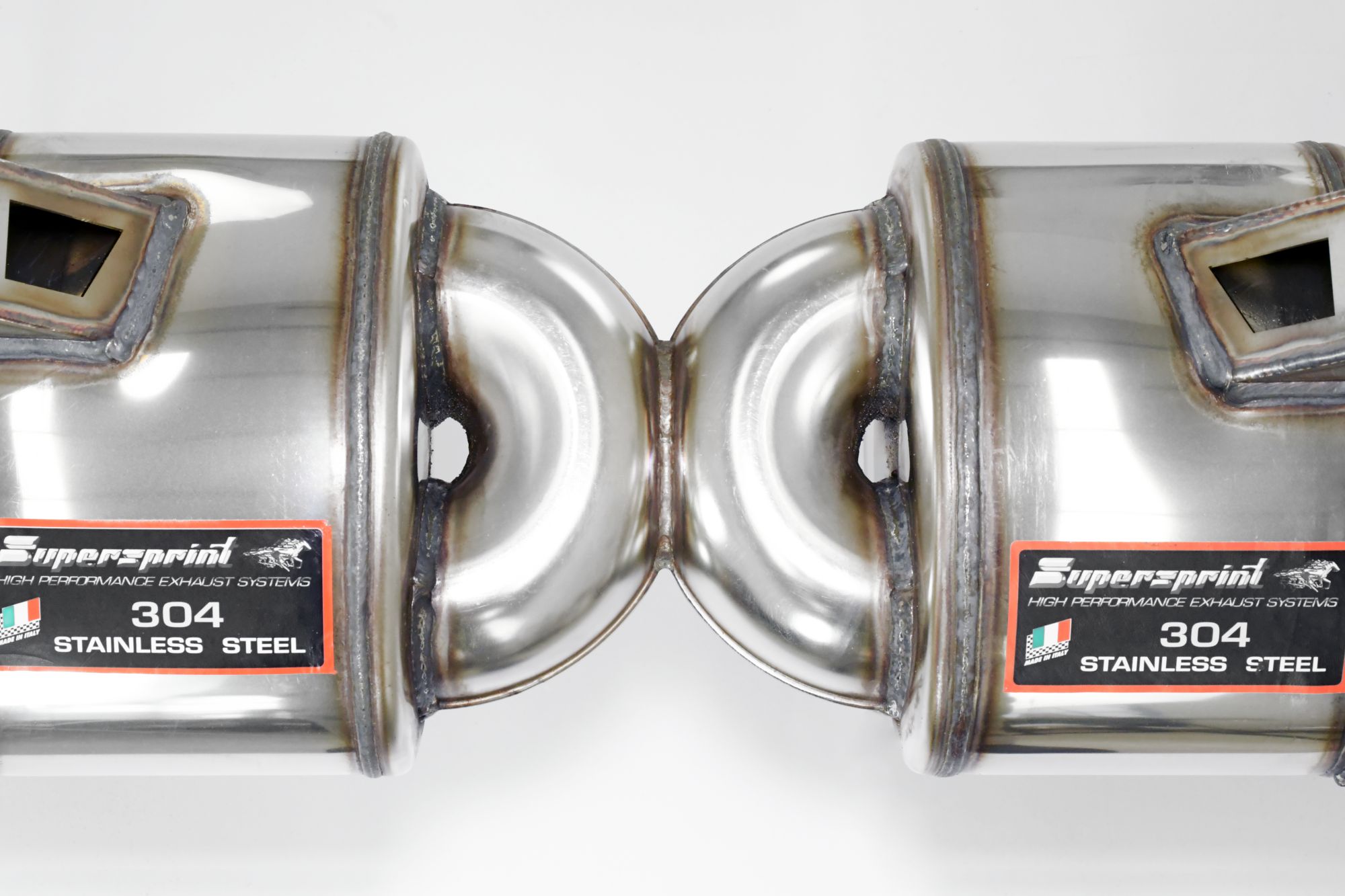 Posteriore "Racing" Destro - Sinistro 4 uscite<br>(Elimina catalizzatore di serie secondari - da montare con terminali di serie)<br><strong><span style="color:#ea0000;">-14,0 Kg</span></strong>
