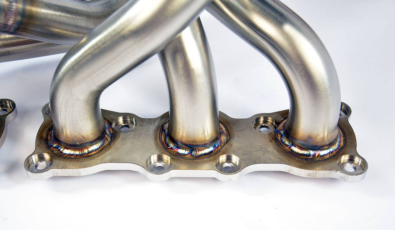 Collettore 100% inox<br>(Guida a sinistra)<br>sostituisce catalizzatore