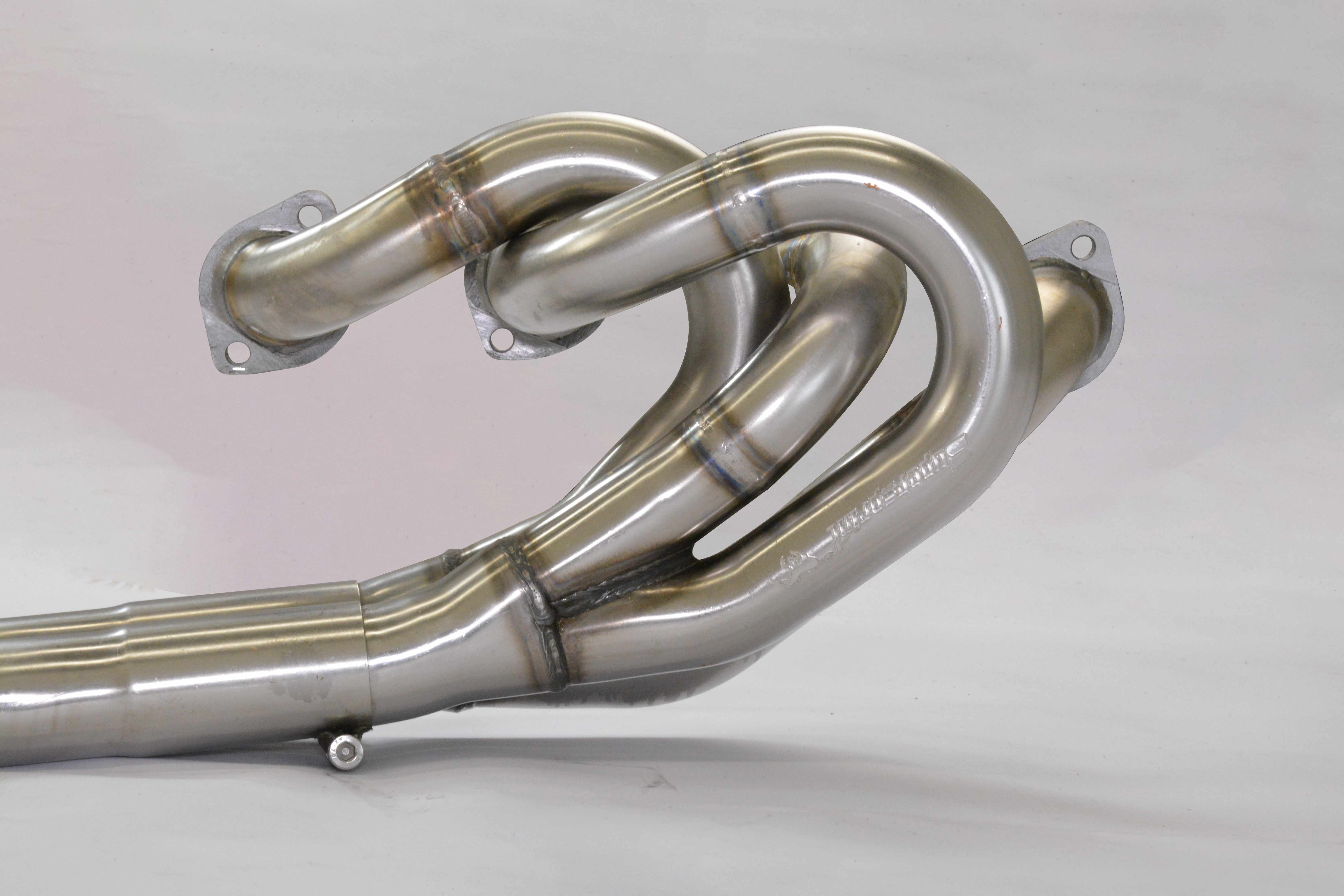 Collettore<br>(Guida a sinistra)<br>Round exhaust ports